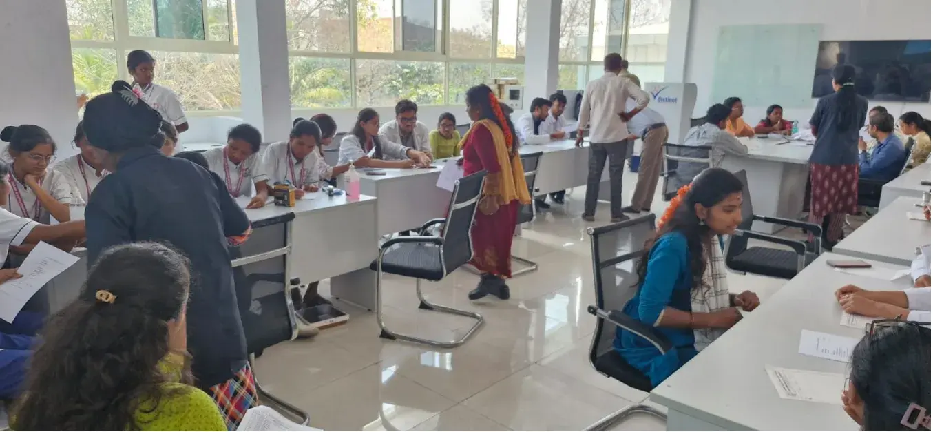 Employees at health check-up stations during the medical camp