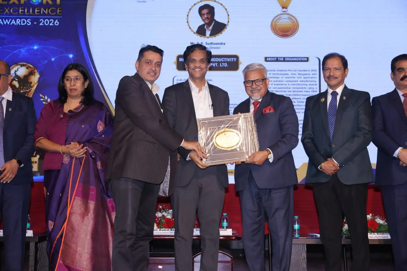 Export Excellence Award 2026 presented to Distinct Productivity Solutions Pvt. Ltd. on 12th August 2026 by Mr. Kamal Bali, President & MD, Volvo India Pvt. Ltd., in the presence of FKCCI President Mrs. Uma Reddy.